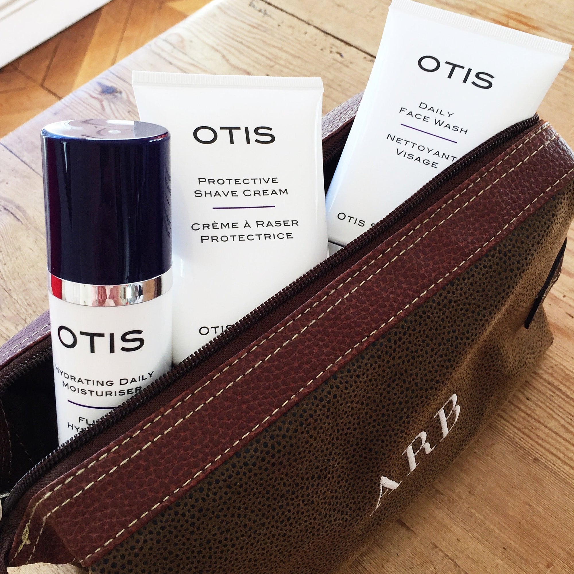 The Best Skincare Routine for Men Who Shave Daily. Otis Skincare products in leather wash bag