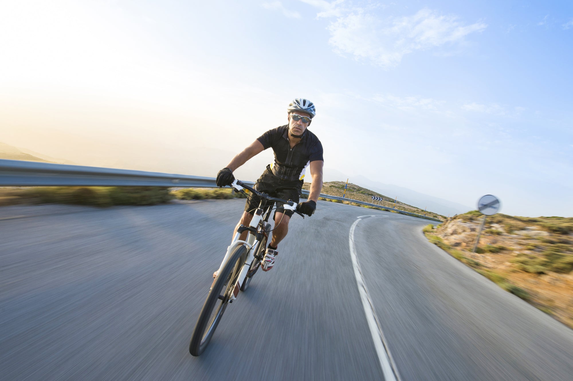 man with healthy skin cycling