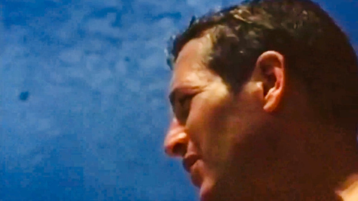 Paul Newman - handsome man's profile against blue summer sky