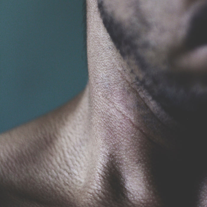Top 5 Shaving Mistakes Men Make (and How to Fix Them). Close up of man's neck, red and irritated from shaving badly