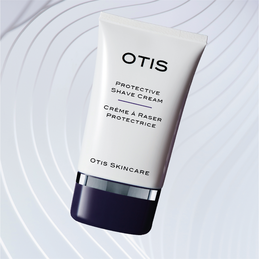 Tube of OTIS Protective Shave Cream on white wavy textured background